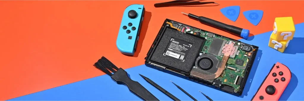 Reparación de Nintendo Switch: consola abierta con herramientas